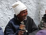 Mustang Lo Manthang Tiji Festival Day 1 02 Man Spinning Prayer Wheel